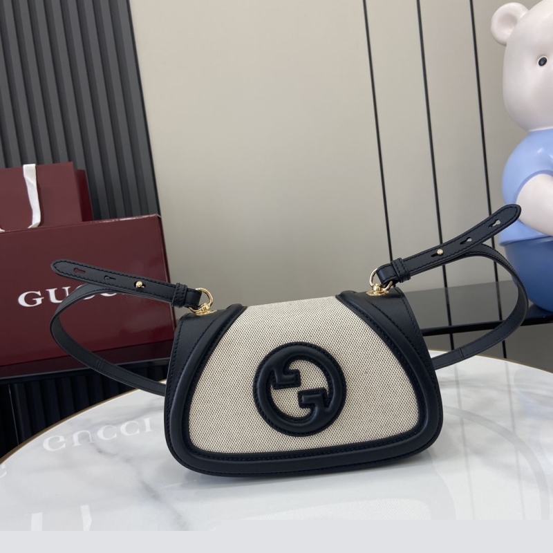 G*u*i satchel bags